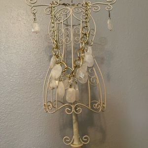 Gold toned chain necklace with white rectangle beads